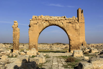 Low angle view of old ruins against clear sky