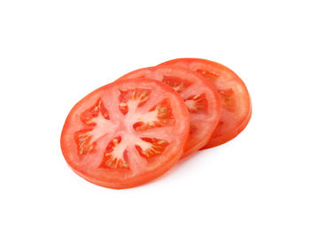 Close-up of red apple against white background