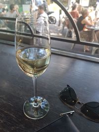 Close-up of wineglass on table