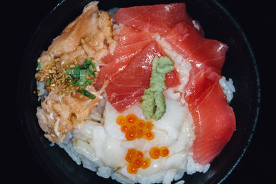 Close-up of fish with rice served in bowl