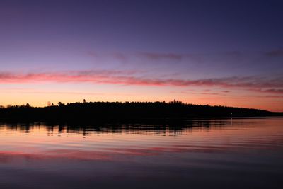 Scenic view of lake against sky during sunset - lysaker 