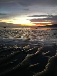 Scenic view of sea against sky during sunset