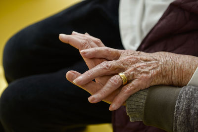 Cropped image of people hands at home