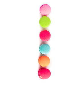 Close-up of multi colored balls on white background