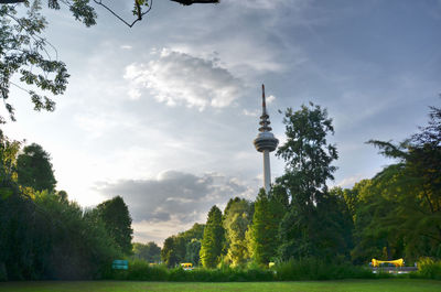 View of tower against cloudy sky