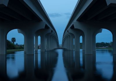 Reflection of bridge in water