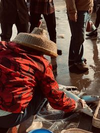 Low section of people working on street