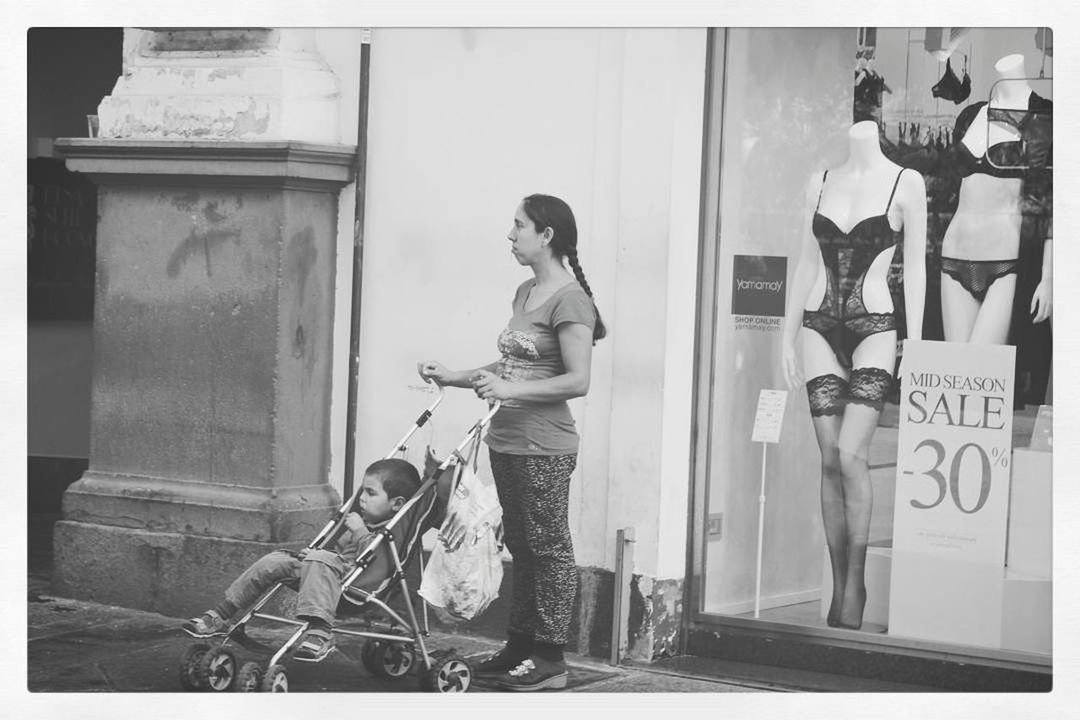 city street, transportation, mode of transport, city, one woman only, adult, outdoors, people, adults only, full length, one person, only women, day, fuel pump