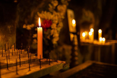 Close-up of illuminated candles