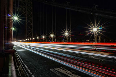 Light trails on road at night