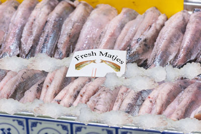 Soused herring at market for sale