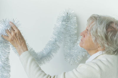 Portrait of woman with snow on hair