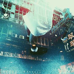 Low section of woman walking in city