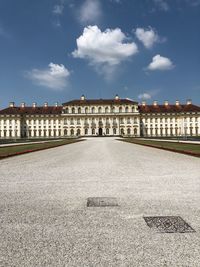 Palace in city against sky