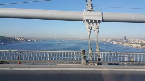 Bosphorus bridge over strait seen through car window