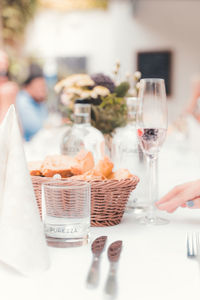 Close-up of wedding decorations and food on a table