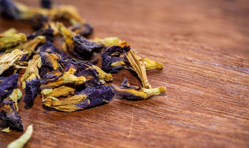 Close-up of dry flowers on table