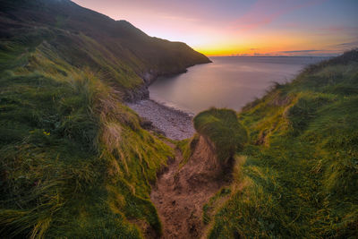 Scenic view of sea against sky during sunset