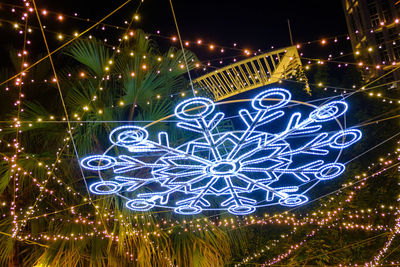 Illuminated christmas lights at night