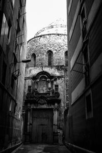 Low angle view of old buildings against sky