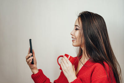 Young woman using mobile phone