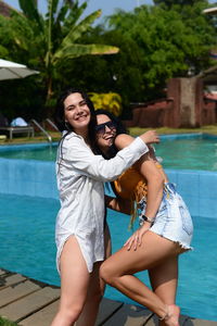 Portrait of models on the pool side