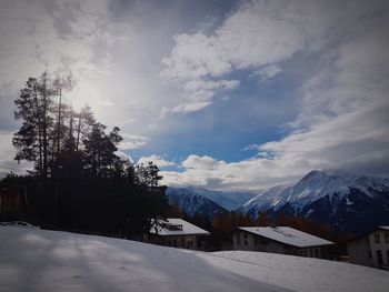 Scenic view of mountains against sky during winter