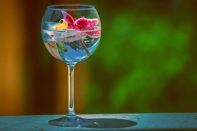 Close-up of wine in glass on table