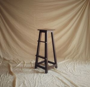 Lifeguard hut on bed against wall at home