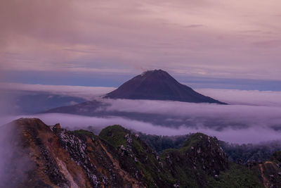 Scenic view of mountains against sky during sunset