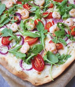 High angle view of fresh pizza on table