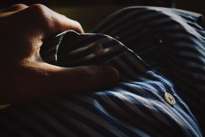 Close-up of hand holding hands