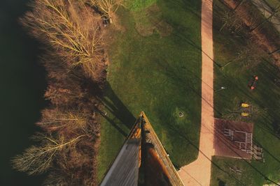 High angle view of bridge amidst trees in city