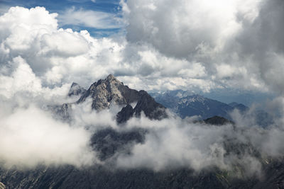 Mountain peaks were drowned in clouds