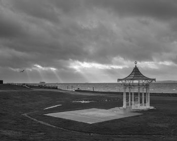 Light rays over the bandstand at southsea in black and white 