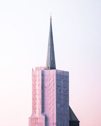 Low angle view of modern building against clear sky