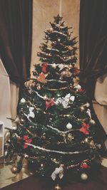 Illuminated christmas tree at home