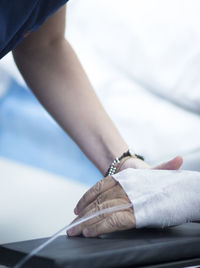 Close-up of patient with iv drip