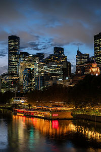 Illuminated buildings in water