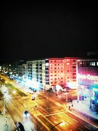 Traffic on city street at night