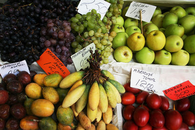 Grocery market with colorful exotic fruits. bright rich picture, including handwritten titles