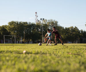 Children playing soccer