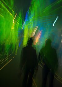 Rear view of people enjoying music concert
