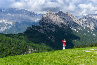 Woman standing on mountain