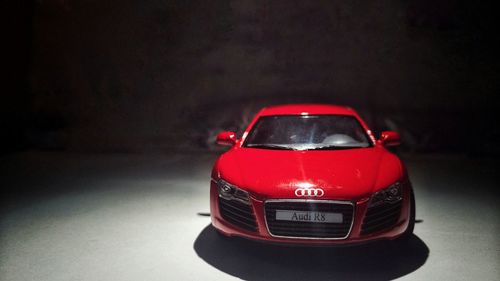 Close-up of car on road at night