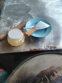 High angle view of hand holding ice cream