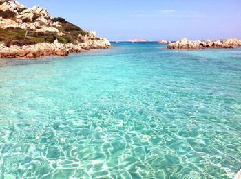Scenic view of sea against blue sky