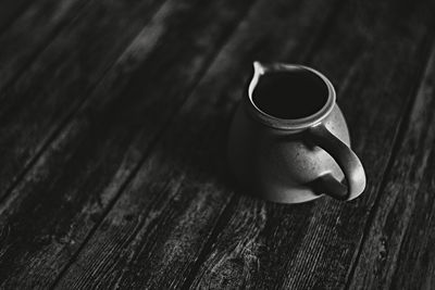 High angle view of coffee cup on table