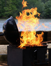 Close-up of fire on barbecue grill