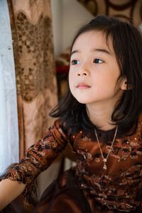 Portrait of woman looking away